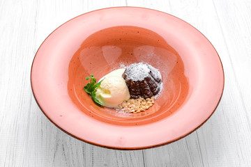 Petit gateau dessert, with vanilla ice cream
