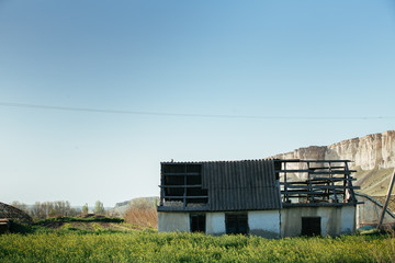 An old abandoned home in a small town in summer