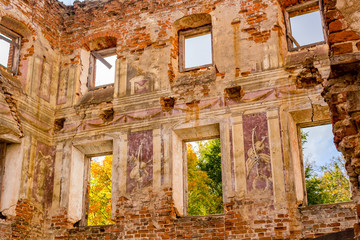 Frescoes on the walls of an old abandoned manor house of the 18th century, a view from the inside....