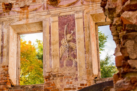 Frescoes on the walls of an old abandoned manor house of the 18th century, a view from the inside. Belkino Manor, Russia