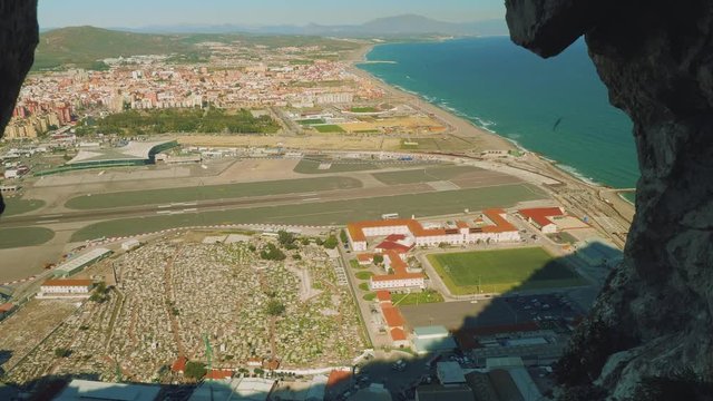 View of La linea de la Concepcion from hole on cliff near old gun