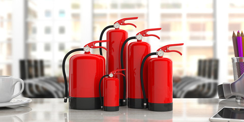 Fire extinguishers on office desk, blur business background. 3d illustration