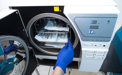 Sterilizing medical instruments in autoclave
