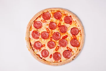 Pizza pepperoni isolated on white. Top view