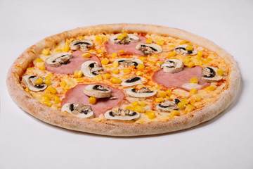 Pizza with chicken, ham and mushrooms isolated on white
