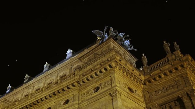 Detail Statues of the night Prague National Theater, Czech Republic