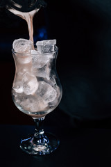 bartender prepares a cocktail