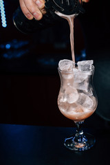 bartender prepares a cocktail