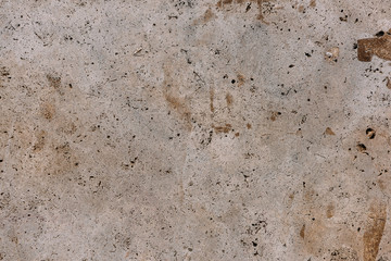 Stone wall with cracks light texture background