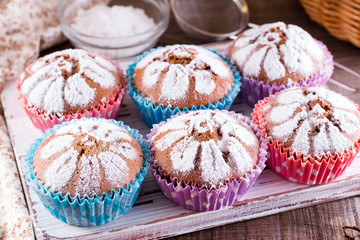 muffins decorated with icing sugar