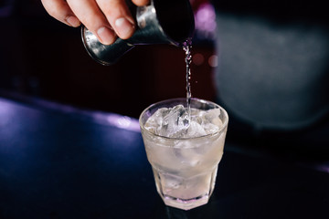 bartender prepares a cocktail