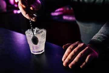 bartender prepares a cocktail