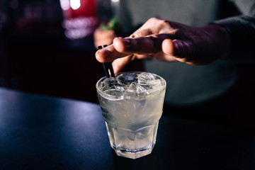 bartender prepares a cocktail