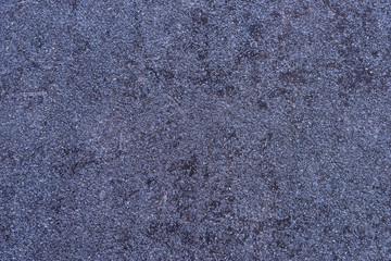 Detailed texture of purple granite wall