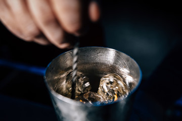 bartender prepares a cocktail