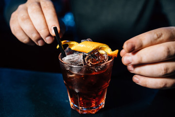 bartender prepares a cocktail