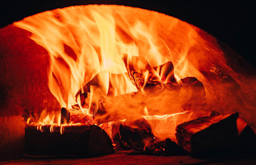 Fire background. Beautiful Fire Close-Up. Video. Burning Firewood in the Fireplace. Firewood Burn...