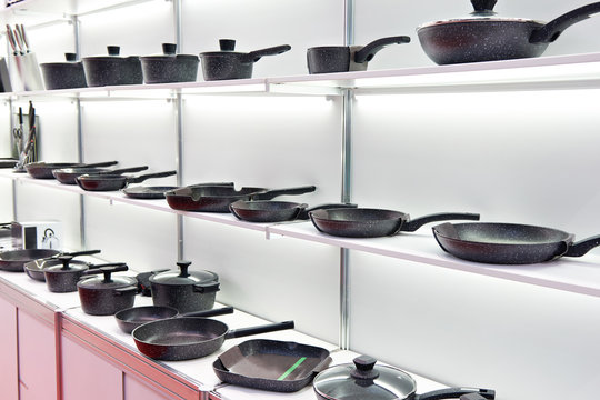 Modern cooking pans in store