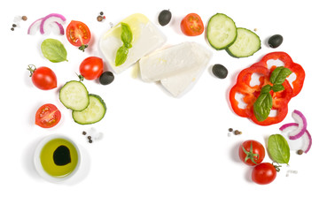 Healthy eating concept - selection of greek salad ingredients on white background