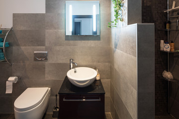 Modern bathroom with large tiles