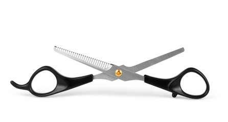 Black hairdressing scissors on a white background