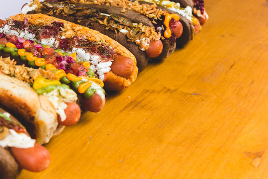 Plenty of various served hot dogs