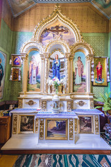 Fototapeta na wymiar Side altar in Orthodox Assumption Church, former Catholic church in Chortkiv, Ukraine
