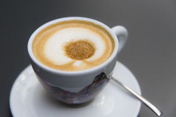 cup of coffee on a gray background