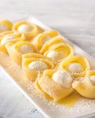 Lumaconi pasta stuffed with bocconcini