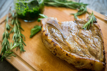 Grilled pork on the rustic background. Selective focus.