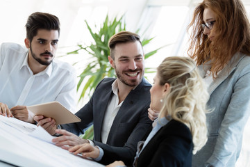 Group of architects working together on project