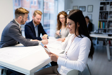 Portrait of young architect woman on meeting