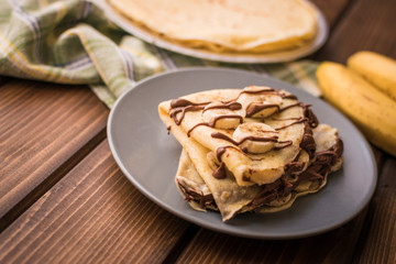 Pancakes with banana and cacao cream. Les crêpes.