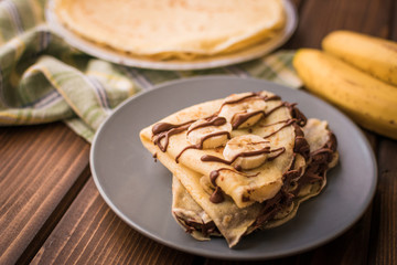 Pancakes with banana and cacao cream. Les crêpes.