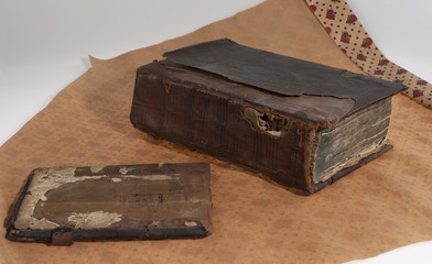 antique book, wrapping paper, on white background, composition.