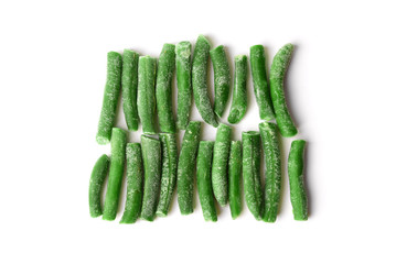 Frozen string beans are arranged in two rows isolated on a white background