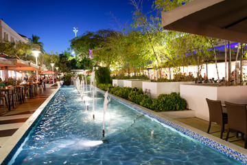 MIAMI BEACH, FL - MARCH 30, 2018: Tourists in Lincoln Road at night. Miami Beach is a famous tourist attraction