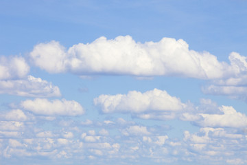 Background of Blue Sky with White Cumulus Clouds.
