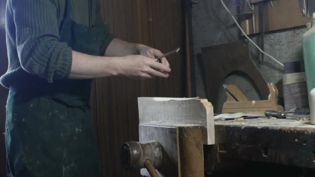 average field carpenter measures with meter and ruler
