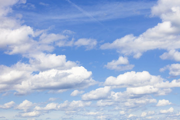 Background of Blue Sky with White Cumulus Clouds.