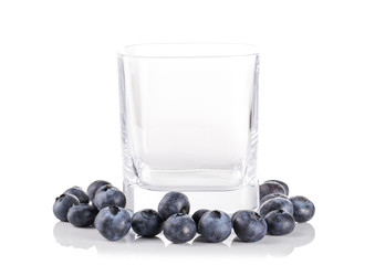 Empty glass and fresh blueberry