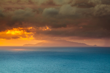 Power of nature dramatic orange sky above ischia island