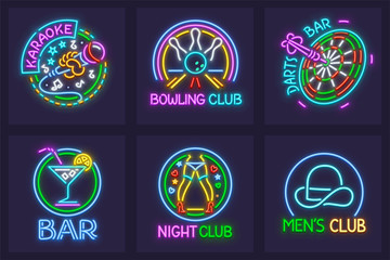 Set of neon signs for nighttime entertainment facilities.