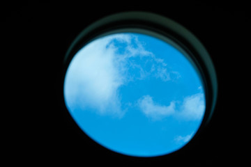 image of a sky through window