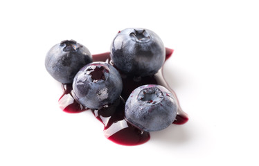 Blueberries And Blueberry Juice On White Background.
