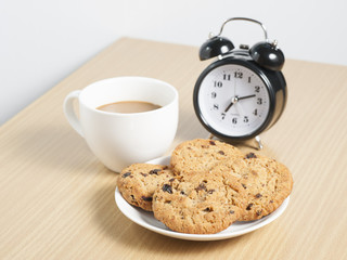 homemade chocolate chip cookies and coffee on the table