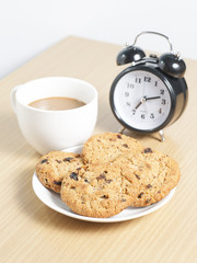 homemade chocolate chip cookies and coffee on the table