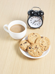 homemade chocolate chip cookies and coffee on the table