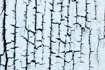 close up texture of cracked wooden background.
