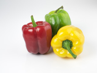 three bell peppers isolated on white background